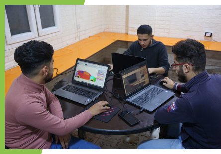 young people work on laptops